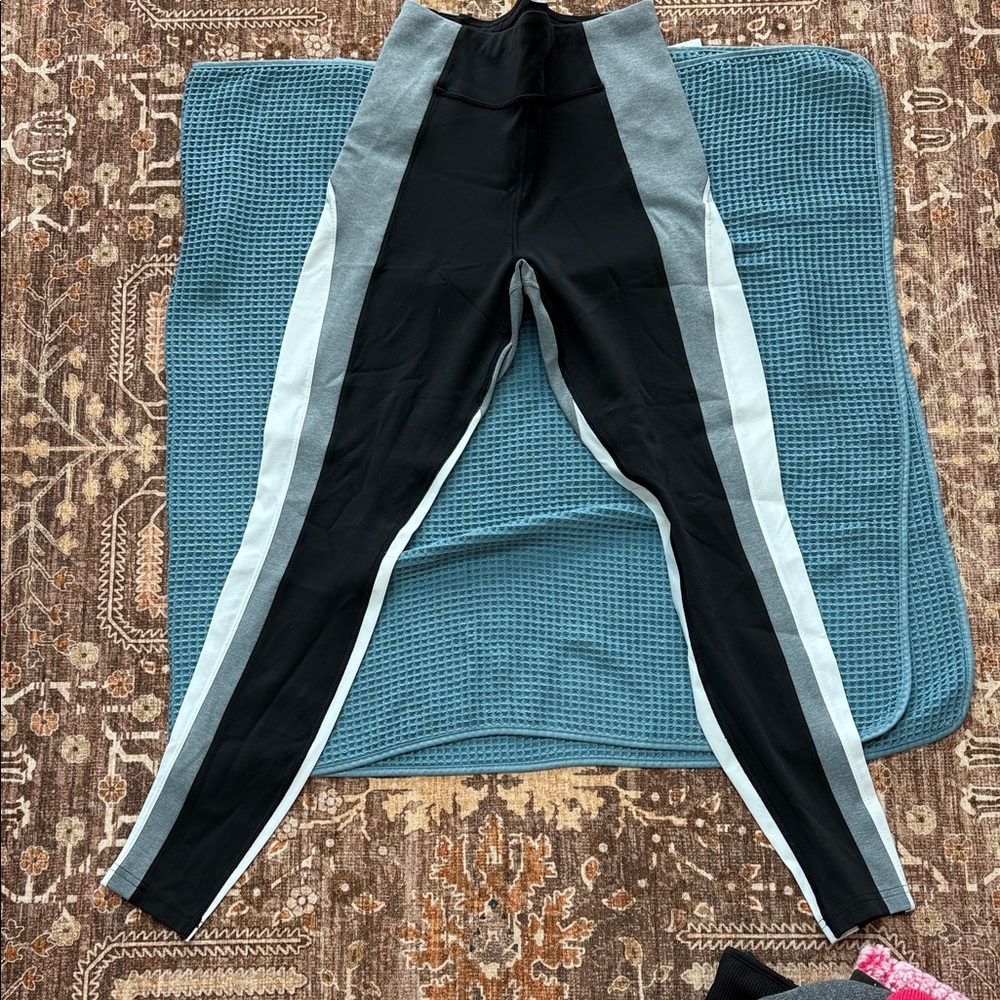 Athleta Black Leggings with Light Blue and White Side Stripes